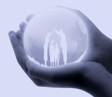 Image of a pair of hands holding a bubble with a family inside