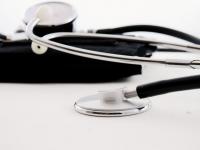 stethoscope a doctor's stethoscope lying on a desk
