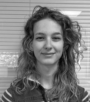 Black and white headshot photo of Eve Poirier