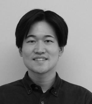 Black and white portrait photo of Takamasa Kurogi